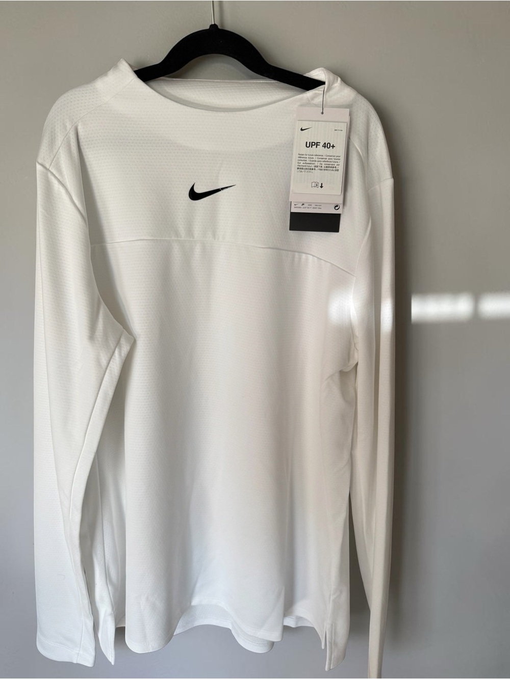 Nike White Long-Sleeve Performance Top with Black Swoosh